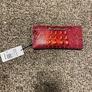 Brand new. Never used. Brahmin wallet